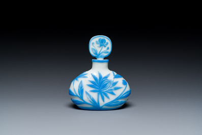 A Chinese blue-overlay white Beijing glass 'meiping' vase, a bowl and a bottle, 19/20th C.