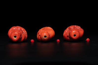 A set of ten Chinese coral-red glass Luohan-form snuff bottles, 20th C.
