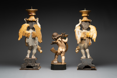 Three gilt and polychromed wooden angel-form candlesticks, Germany, 18th C.