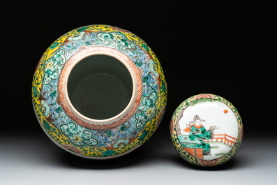 A pair of Chinese famille verte yellow-ground vases and covers with narrative design, 19th C.