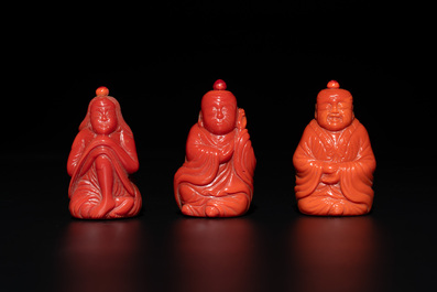 A set of ten Chinese coral-red glass Luohan-form snuff bottles, 20th C.