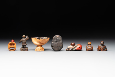 Five Japanese netsukes, a bronze figure and a lacquered burl wood cup, 19th C.