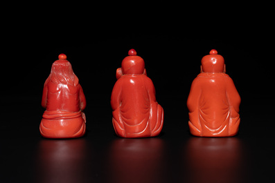 A set of ten Chinese coral-red glass Luohan-form snuff bottles, 20th C.