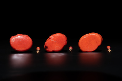 A set of ten Chinese coral-red glass Luohan-form snuff bottles, 20th C.