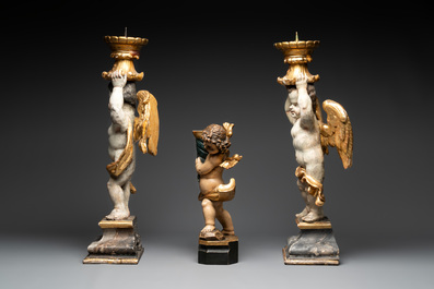 Three gilt and polychromed wooden angel-form candlesticks, Germany, 18th C.