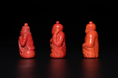 A set of ten Chinese coral-red glass Luohan-form snuff bottles, 20th C.