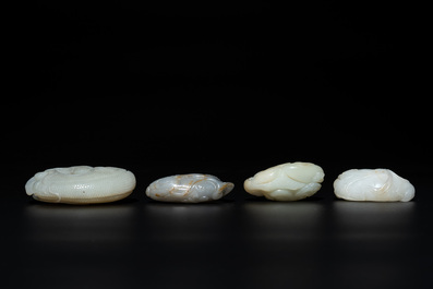 Five Chinese white, celadon and russet jade carvings of three melons, a lotus pod and a lingzhi, 19th C.