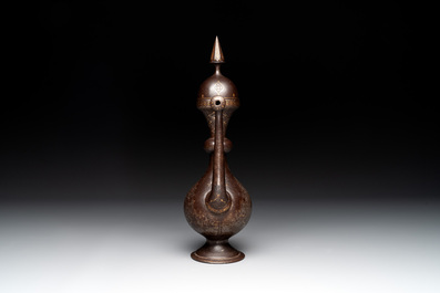 A Persian steel engraved gilt-decorated pear-shaped ewer and cover with floral design, Qajar, 19th C.