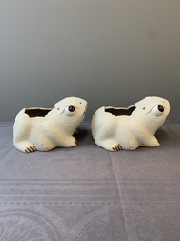 A pair of large Chinese white-glazed biscuit toad-form jardini&egrave;res, 18th C.