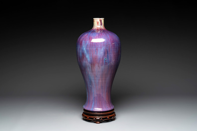 A Chinese flamb&eacute;-glazed 'meiping' vase on wooden stand, 18/19th C.