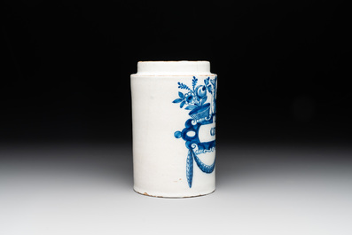 A rare blue and white Dutch Delft albarello with a recumbent deer, inscribed 'EXTR:GENTIAN:', 18th C.