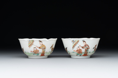 A pair of Chinese eggshell white-glazed cups and saucers, and two famille rose cups, 18th C.