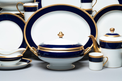 An impressive 94-piece gold-encrusted royal-blue-enamelled 'Palaiseau' service, Bernardaud, Limoges, 20th C.