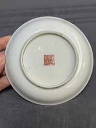 Four Chinese famille rose 'monkey and deer' saucers, Tongzhi mark and of the period