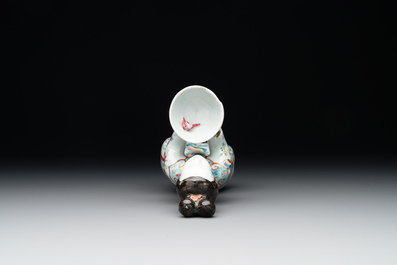 A Chinese famille rose figure of a lady presenting a bowl, Qianlong