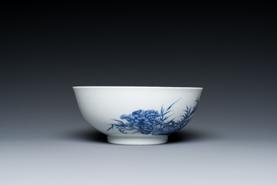 A Chinese blue and white bowl with floral design and a famille verte yellow-ground 'bamboo' bowl, Tongzhi mark, 18/19th C.