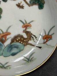 Four Chinese famille rose 'monkey and deer' saucers, Tongzhi mark and of the period