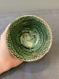 A Chinese green-glazed marbled bowl, probably Tang
