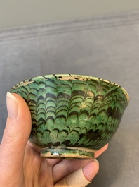 A Chinese green-glazed marbled bowl, probably Tang