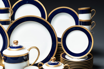 An impressive 94-piece gold-encrusted royal-blue-enamelled 'Palaiseau' service, Bernardaud, Limoges, 20th C.
