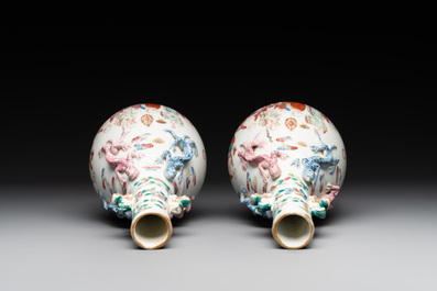 A pair of Chinese famille rose '18 Luohan' bottle vases, 19th C.