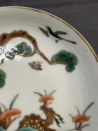 Four Chinese famille rose 'monkey and deer' saucers, Tongzhi mark and of the period