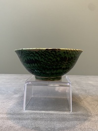 A Chinese green-glazed marbled bowl, probably Tang