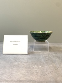 A Chinese green-glazed marbled bowl, probably Tang
