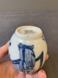 A Chinese blue and white tea caddy and cover with figural design, Kangxi