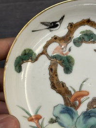Four Chinese famille rose 'monkey and deer' saucers, Tongzhi mark and of the period