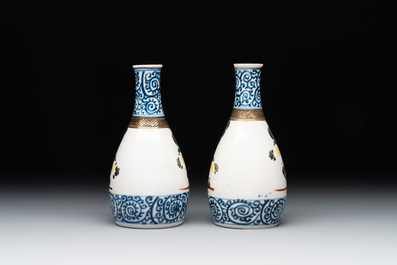 A Japanese lacquerware picnic set with two sake bottles, Meiji, 19th C.