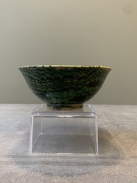 A Chinese green-glazed marbled bowl, probably Tang
