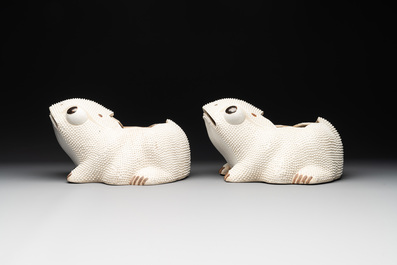 A pair of large Chinese white-glazed biscuit toad-form jardini&egrave;res, 18th C.