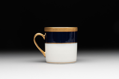 An impressive 94-piece gold-encrusted royal-blue-enamelled 'Palaiseau' service, Bernardaud, Limoges, 20th C.