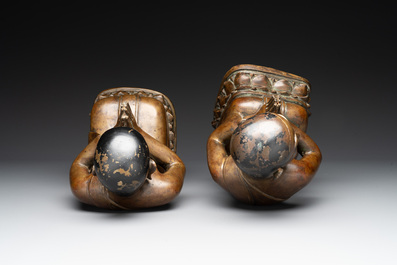 Two Burmese partly lacquered bronze praying monks, 18/19th C.