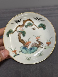 Four Chinese famille rose 'monkey and deer' saucers, Tongzhi mark and of the period