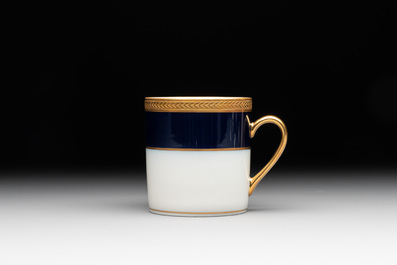 An impressive 94-piece gold-encrusted royal-blue-enamelled 'Palaiseau' service, Bernardaud, Limoges, 20th C.