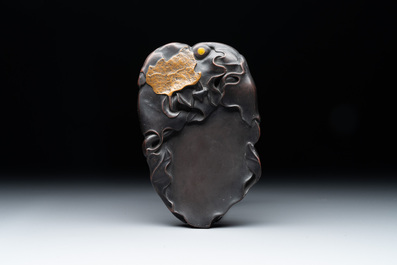A Chinese archaistic bronze 'you 卣' vessel and cover, an inkstone and two calligraphy brushes, 20th C.