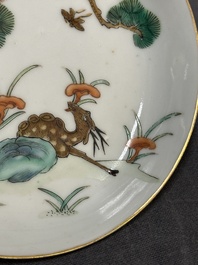 Four Chinese famille rose 'monkey and deer' saucers, Tongzhi mark and of the period