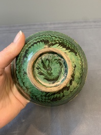 A Chinese green-glazed marbled bowl, probably Tang