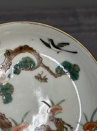 Four Chinese famille rose 'monkey and deer' saucers, Tongzhi mark and of the period