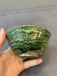A Chinese green-glazed marbled bowl, probably Tang