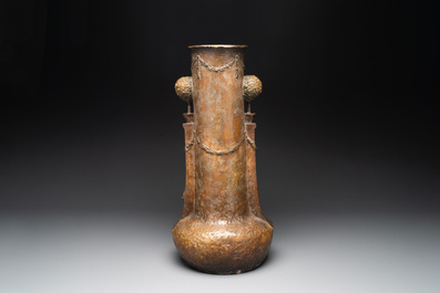 An Art Nouveau terracotta 'Amorous Couple' vase by  Adolphe-Jean Lavergne for Goldscheider, ca. 1900
