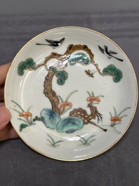 Four Chinese famille rose 'monkey and deer' saucers, Tongzhi mark and of the period