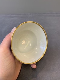 A Chinese gilt-decorated blue and white 'lotus scroll' bowl, Daoguang mark and of the period