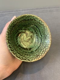A Chinese green-glazed marbled bowl, probably Tang