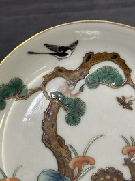 Four Chinese famille rose 'monkey and deer' saucers, Tongzhi mark and of the period