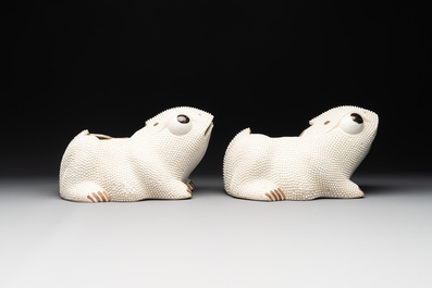 A pair of large Chinese white-glazed biscuit toad-form jardini&egrave;res, 18th C.