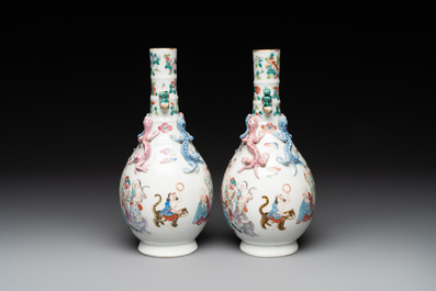 A pair of Chinese famille rose '18 Luohan' bottle vases, 19th C.