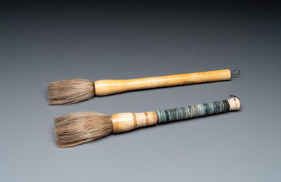 A Chinese archaistic bronze 'you 卣' vessel and cover, an inkstone and two calligraphy brushes, 20th C.